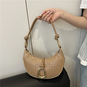 Khaki woven crescent handbag featuring a gold horseshoe buckle and thick rope handle