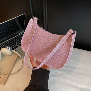 Elegant pink glitter hobo bag for women with a metallic finish and crescent shape design