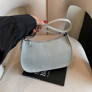 Sparkling silver sequin baguette shoulder bag for women with minimalist metal zipper