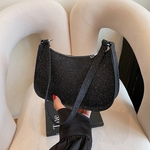 Sparkly black hobo bag for women with rhinestone details and stylish shoulder strap