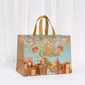 Waterproof non-woven Christmas gift bag with golden reindeer and Merry Christmas print