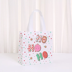Cartoon gingerbread Christmas non-woven gift bag with Ho Ho Ho print and sturdy handles