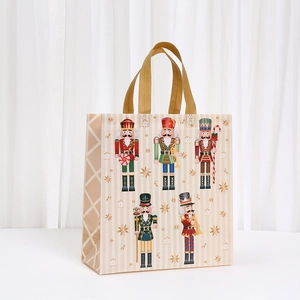 Christmas nutcracker non-woven tote bag with golden handles and festive pattern