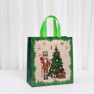 Close-up of Christmas nutcracker soldier and tree prints on waterproof non-woven gift bag