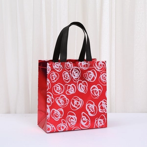 Sacchetto regalo rosso impermeabile in tessuto non tessuto con rose stampate
