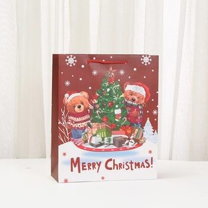 Sac cadeau de Noël avec ours mignons, poignées rouges et illustration festive
