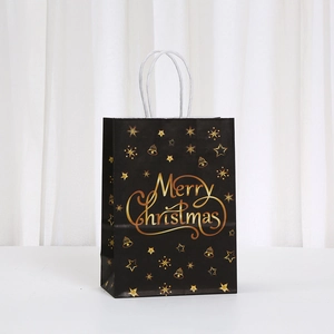 Black Christmas kraft paper gift bag with golden Merry Christmas text and snowflake prints