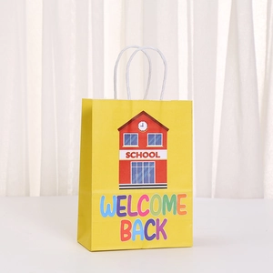Yellow Back to School paper gift bag with cartoon school building and white handles