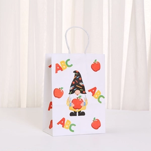 White Back to School paper gift bag with cute gnome print and ABC apple patterns