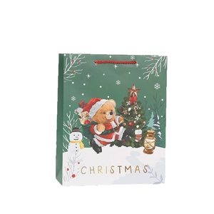 Christmas gift bag with cute bear and tree illustrations on dark green background