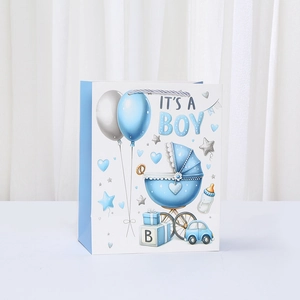 Sac cadeau bleu 'IT'S A BOY' avec motifs pour célébration de naissance