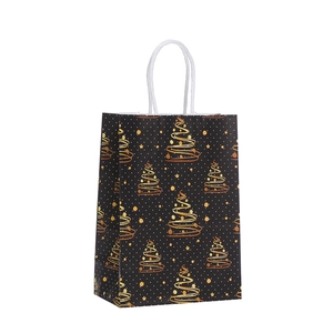 Black kraft paper Christmas gift bag featuring gold spiral tree prints and white handles