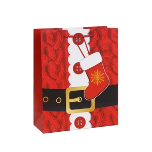 Christmas Santa suit gift bag made of red paper with belt and snowflake sock print