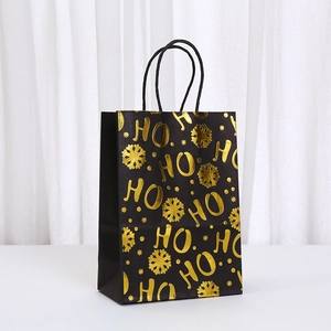 Elegant black Christmas gift bag with gold foil snowflakes and HO HO lettering