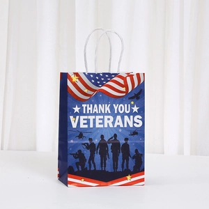 Navy blue Veterans Day paper gift bag with American flag pattern and soldier silhouettes