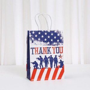 Detail of American flag gift bag with Thank You text and soldier silhouette print