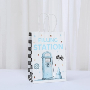 Racing themed white paper gift bag with Filling Station print and rope handles