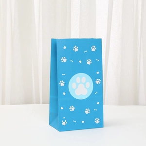 Blue kraft paper gift bag with white paw prints and bone patterns for pet party shopping