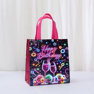 Pink Happy Birthday non-woven gift bag featuring neon cocktail glass print with handles