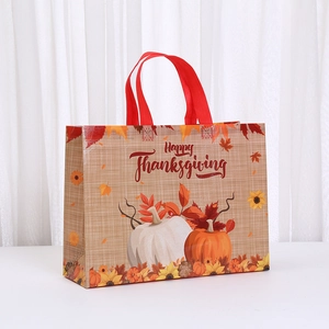 Waterproof Happy Thanksgiving gift bag with autumn pumpkin print and red handles