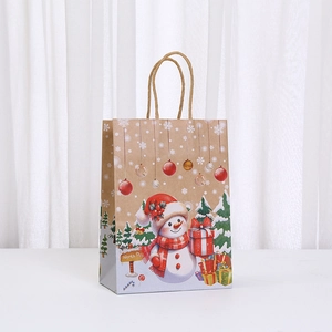 Christmas Kraft paper gift bag featuring a cute snowman and North Pole illustration