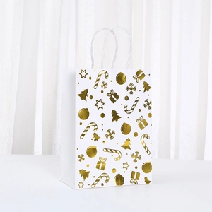 White Christmas gift bag with gold foil holiday patterns and woven handles for party favors