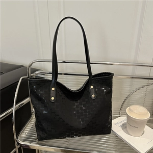 Große schwarze Tote Bag mit Monogramm-Muster für den täglichen Pendelverkehr