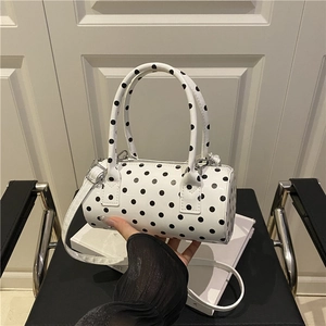 Polka dot cylinder pillow bag for women with top handles and adjustable strap