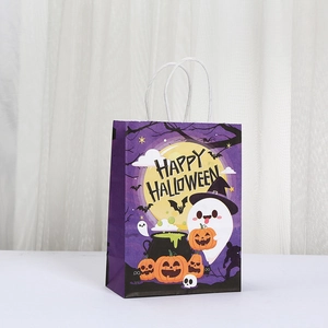 Detail view of purple Happy Halloween gift bag with gold foil ghosts and pumpkin motifs
