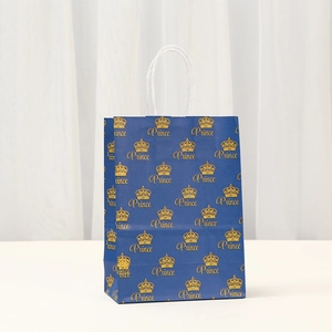 Deep blue kraft paper gift bag with gold crown pattern and sturdy white rope handles