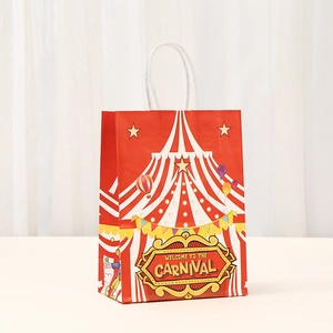 Detail of red carnival gift bag with white twisted handles and circus tent print