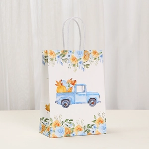 Detail of floral gift bag with a vintage truck carrying pumpkins for fall events