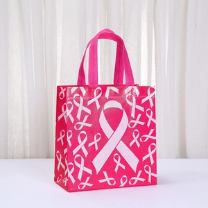 Borsa regalo rosa in tessuto non tessuto con stampa nastro bianco e manici robusti