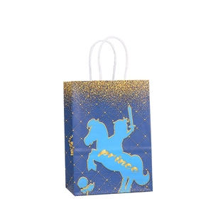 Blue kraft paper gift bag with prince silhouette and gold glitter crown patterns