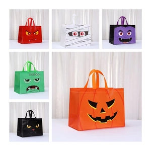 Set of six Halloween non-woven gift bags with pumpkin mummy and vampire designs