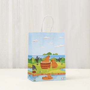 Blue Kapybara gift bag with cartoon prints and white rope handles for party shopping