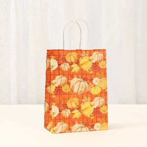 Kraft paper Thanksgiving gift bag with pumpkins and maple leaves on orange grid