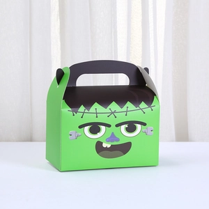 Detail of Frankenstein Halloween candy box with green cartoon face and black handle
