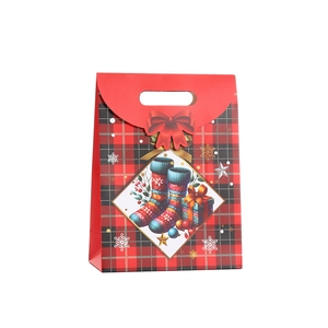 Christmas gift bag with red black plaid pattern and festive holiday illustrations