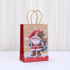 Christmas kraft paper gift bag featuring Santa Claus illustration and red rope handles