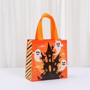 Detailed view of Halloween tote bag with ghosts and castle prints on orange non-woven fabric