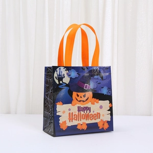 Halloween pumpkin non-woven gift bag with orange handles and Happy Halloween print