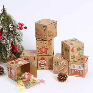 Brown kraft paper Christmas advent calendar boxes with festive holiday prints for candies