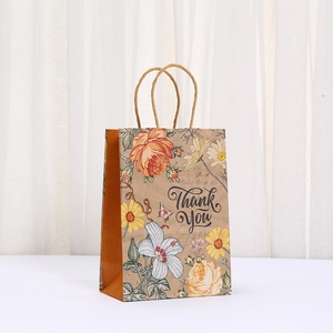 Vintage kraft paper gift bag with floral patterns and Thank You text for birthdays