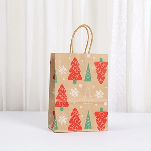 Christmas kraft paper gift bag featuring a cute festive tree and snowflake print