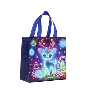 Navy non-woven Christmas gift bag with neon reindeer and festive holiday prints