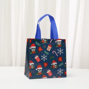 Gothic skull Christmas pattern waterproof non-woven gift tote bag with blue handles