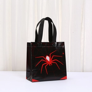 Non-woven Halloween gift bag featuring a large red spider and web on a black finish