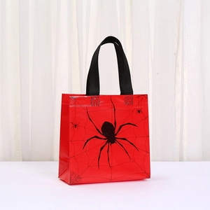 Halloween red non-woven tote bag with black spider print and web pattern detail