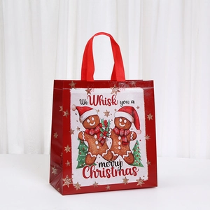 Red Christmas gingerbread man non-woven gift tote bag with golden star patterns